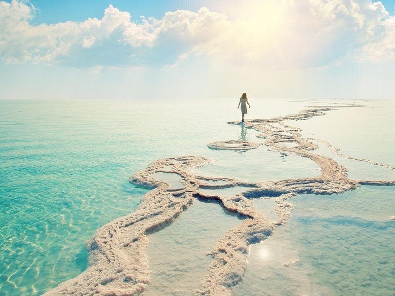 Salt crusted into ledges at the edge of the Dead Sea