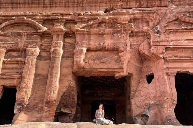 The carved doorway of a Nabataean tomb at Petra, banded rock inside