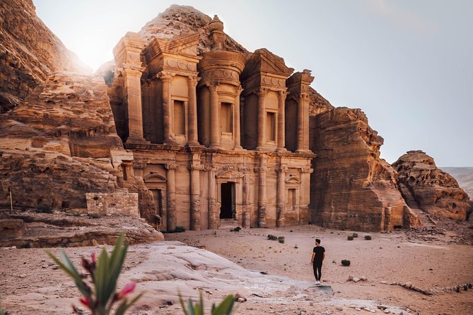 A single walker on the terrace below the Monastery at Petra