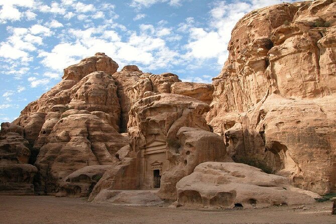 A side canyon at Petra, its sandstone banded in rose and cream
