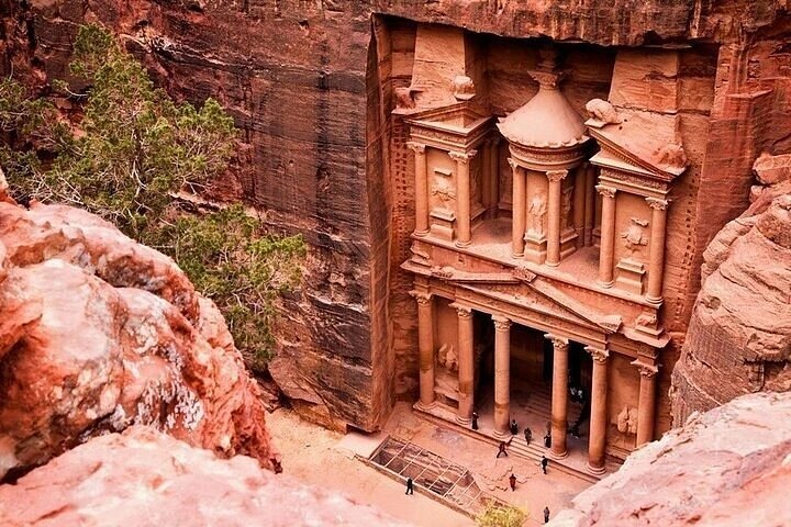 Al-Khazneh, the Treasury at Petra, carved into the rose sandstone cliff