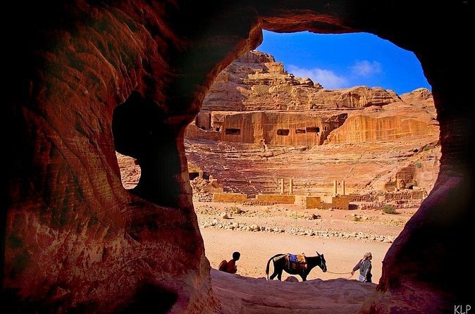 The Treasury at Petra framed through the mouth of a rock-cut chamber