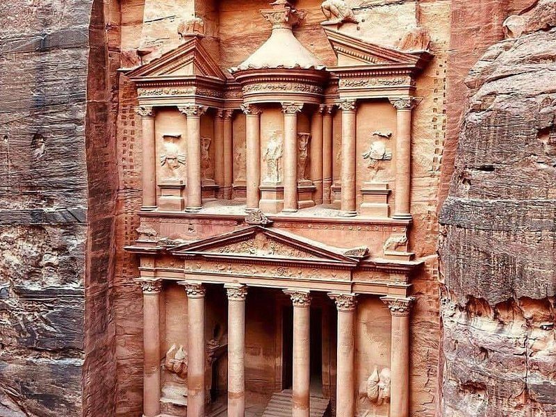 The full two-storey front of the Treasury at Petra in late-morning light