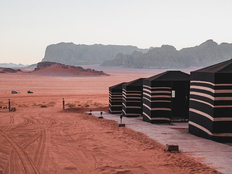 Tents of a Bedouin camp in Wadi Rum at first light