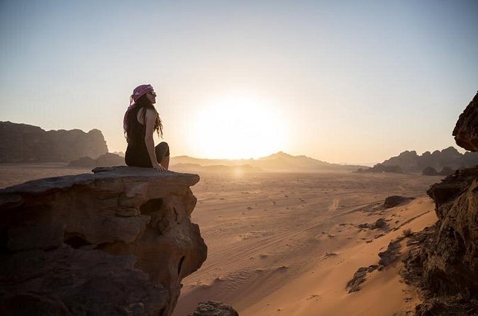 Sunrise over the sand and sandstone of the Wadi Rum Protected Area